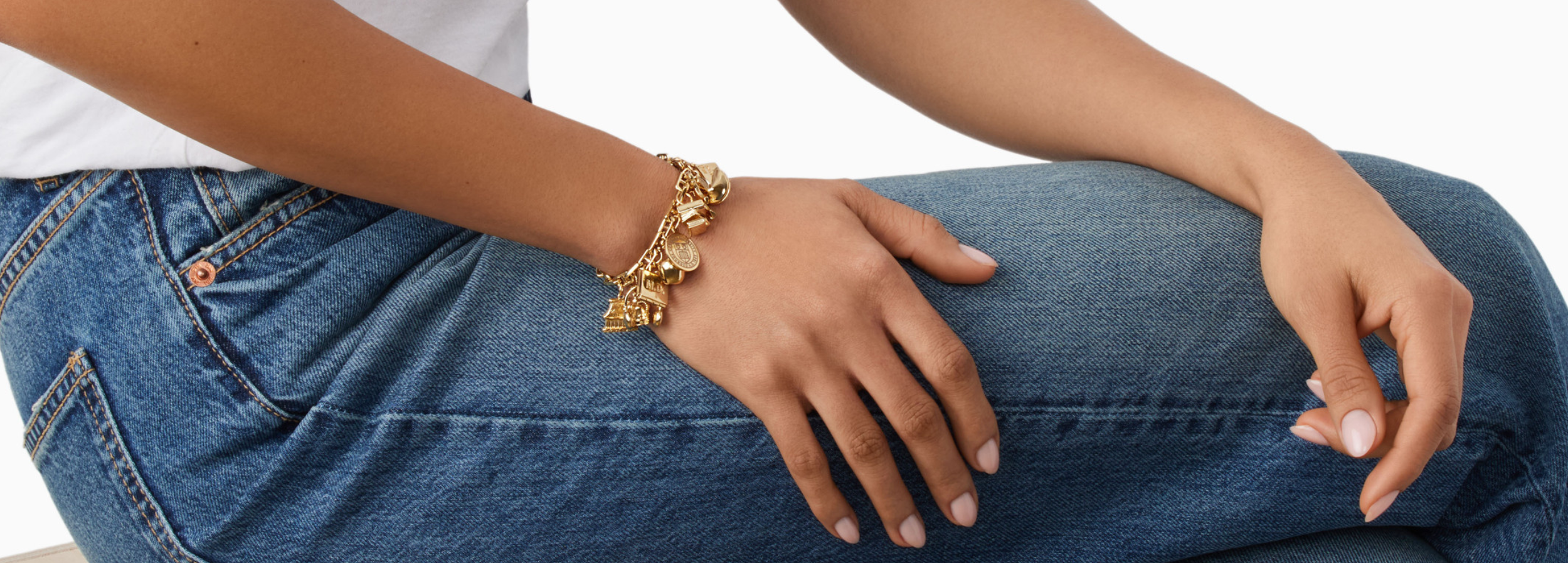 recent grad with new charm bracelet